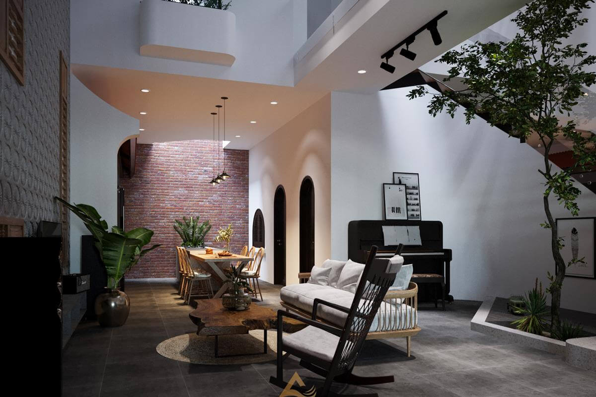 Phòng khách nhà phố mang đậm phong cách Indochine với các chi tiết bàn gỗ, tường gạch nung